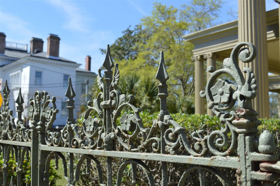 The top of a fence along a home on South Front Street